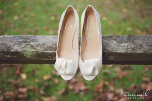 Hagley wedding fairytale shoes on fence