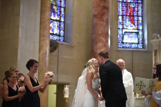 Kerry Harrison nemours waterfall wedding kiss at altar