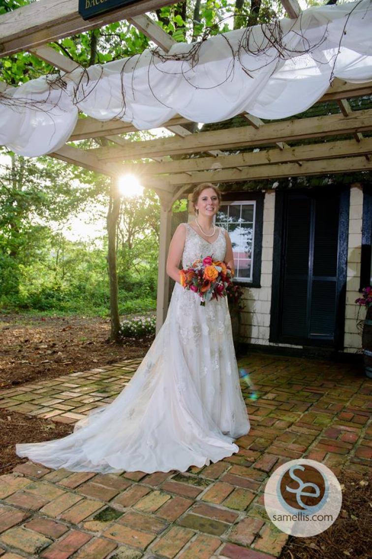 Nassau Valley Sam Ellis bride under trellis drape